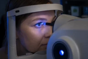 Patient undergoing OCT retinal imaging diagnostic scan at The Eye Dr Clinic ophthalmology practice in West Yorkshire